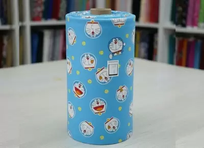 Doraemon celeste - Tela de alta calidad diseño Doraemon celeste disponible en Telas593.